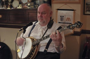 'Southend Bob' Albutt (banjo & vocals) of The Original Eastside Stompers Jazz Band at Farnborough Jazz Club, Kent, UK, on 21st May 2010. Photo by Howard Leigh