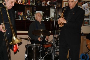 Lovely pic of Laurie on drums, with Mike Pointon on trombone and Colin Bray on curley soprano sax in Laurie Chescoe's Reunion Band at Farnborough Jazz Club on 14th November 2014. Photo by Mike Witt.