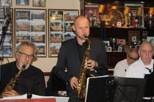 Willem Hellbreker takes a (brilliant) solo with Limehouse Jazzband at Farnborough Jazz Club, Kent (UK) on 24th October 2014. (+l2r) Henri Giebels, & Marten de Nes. Photo: Mike Witt