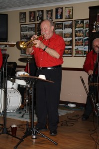 MIKE BARRY (trumpeter & vocalist) with his Mike Barry's Uptown Gang seen here at Farnborough Jazz Club, Kent, UK on 28th November 2014. Photo by Mike Witt.