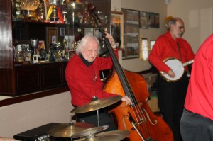 TREFOR WILLIAMS (d,bass) with MIKE BARRY'S UPTOWN BAND seen here at Farnborough Jazz Club, Kent, UK on 28th November 2014. Photo by Mike Witt.