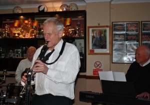 Bernie Holden, clarinettist  (with  pianist Hugh Crozier & drummer Laurie Chescoe) in Bob Dwyer's Bix & Pieces  at Farnborough Jazz Club, 30jan2015.  Photo by Mike Witt.