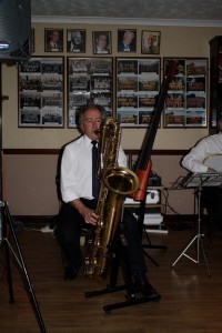 MICK SCRIVEN playing big bertha (bass sax) for NAPIER HOTSHOTS at Farnborough Jazz Club on Friday 16th January 2015. Photo by Mike Witt.
