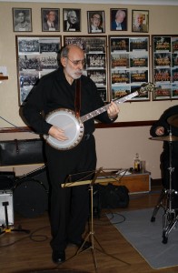 John Stuart (banjo)  with Mike Barry's XXL Jazz Band at Farnborough Jazz Club, 13Feb2015. Photo by Mike Witt.