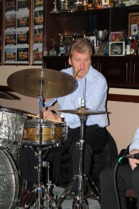 John Tyson, drummer with Barry Palser's Super Six at Farnborough Jazz Club, Kent , 27feb2015. Photo by Mike Witt.