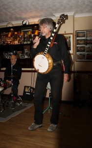 WOLFGANG E. OTT (banjo) and HEINI “THE TINY” BUCKENMAIER (drums) play for 'Hot Lips' of Munich, Germany on 2015 UK Tour. Seen at Farnborough Jazz Club, Kent 6th March. Photo by Mike Witt.