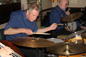 Chris Marchant (drums) & 'Southend Bob' Albutt (banjo) of Mahogany Hall Stompers at Farnborough Jazz Club, 13Mar2015. Photo by Mike Witt.