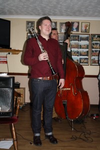 Adrian Cox (clarinet) enjoys guesting with Martyn Brothers at Farnborough Jazz Club, Kent on 3rd April 2015. Photo by Mike Witt.
