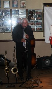 Derek Scofield plays clarinet with Dave Rance's Rockin' Chair Band at Farnborough Jazz Club (Kent) on 12th June 2015.  (hidden is Mike Brewerton on d.bass).  Photo by Mike Witt.