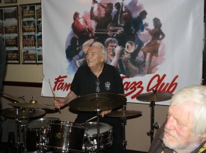 Another great picture of smiling Laurie Chescoe with his Reunion Jazz Band at Farnborough Jazz Club, Kent on 3rd July2015 (John Lee bottom right). Photo by Mike Witt.