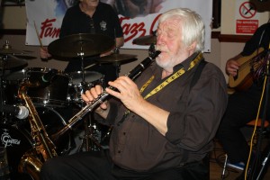 ohn Lee on clarinet with Laurie Chescoe's Reunion Jazz Band at Farnborough Jazz Club, Kent on 3rd July 2015. Photo by Mike Witt.