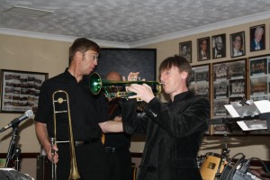 Bill Todd on trombone and Paul Higgs on trumpet (John Stewart banjo - obscured from view) with Phoenix Dixieland Jazz Band at Farnborough Jazz Club on 5th June 2015. Photo By Mike Witt.