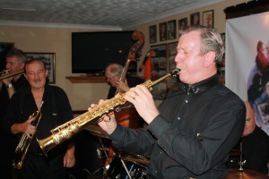 Saxophonist All Nicholls on alto and trumpeter Denny Ilett, two of Tony Pitt's All Stars at Keith's special birthday, Farnborough Jazz Club on 14th August 2015. Photo by Mike Witt.