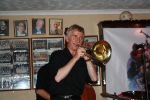 Graham Hughes (trombone), one of Tony Pitt's All Stars at Keith's special birthday at Farnborough Jazz Club, 14th August 2015. Photo by Mike Witt.