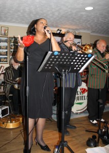 Harry Strutters Hot Seven at Farnborough Jazz Club 7th August 2015. (LtoR) Maurice Dennis (banjo), Marlene Hill (vocals), Paul Taylor (trombone) & Mike 'Megs' Etherington. Photo by Mike Witt.
