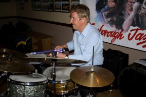 Glowing drummer John Tyson, one of Barry Palser's Super Six at Farnborough Jazz Club, Kent 19June2015