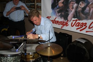21.Glowing drummer John Tyson, one of Barry Palser's Super Six at Farnborough Jazz Club, Kent 19June2015