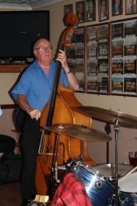 John Sirett plays double bass with George 'Kid' Tidiman's All Stars at Farnborough Jazz Club on 18th September 2015. Photo by Mike Witt.