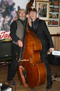 What a picture, what a photograph! These two likely lads are Roger Curphey and Paul Higgs seen here with Phoenix Dixieland Jazz Band at Farnborough Jazz Club on 22nd January 2016. Photo by Mike Witt.