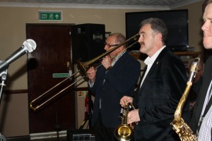 'Jonny Boston's Hot Jazz' front line (LtoR Dave Hewitt plays trombone, with Gary Wood (trumpet) & Jonny Boston (sax)) on tour at Farnborough Jazz Club, Kent, UK 4th March 2016. Photo by Mike Witt.
