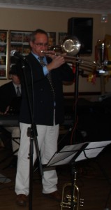 Rob Pearce, band leader of Mardi Gras JazzBand,  plays trombone at Farnborough Jazz Club (Kent) on 19th February 2016. Photo by Mike Witt.