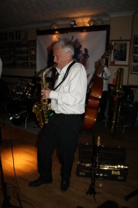 Bernie Holden plays alto sax with Bob Dwyer's Bix &Pieces at Farnborough Jazz Club on 18th March 2016. Photo by Mike Witt.
