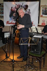 Charles Sherwood (reeds) of Phoenix Dixieiland Jazz Band plays sax at Farnborough Jazz Club on 11th March 2016. Photo by Mike Witt.