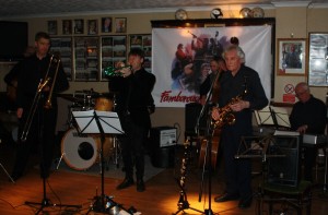 Phoenix Dixieland Jazz Band at Farnborough Jazz Club with (LtoR)(hidden-John Stuart (bnj), Bill Todd (trb), (hidden Alan Clake (drms), Paul Higgs (trp), (hidden Roger Curphey (d.bass) Charles Sherwood (rds) & Dave Barnes (pno). 11th March 2016. Photo by Mike Witt.