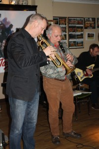 Friend Norman Grodentz (clarinet) joins Martyn Brothers for couple of numbers (here with Finlay Milne on trumpet) here at Farnborough Jazz Club (Kent) on 15th April 2015. Photo by Mike Witt.