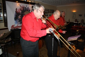 Mike Barry's Uptown Gang (Front Line) at Farnborough Jazz Club on 8th April 2016. (LtoR) 'Whispering MIke' Holt(tmb), Mike Barry (trp), Goff Dubber (alto sax). Photo by Mike Witt.