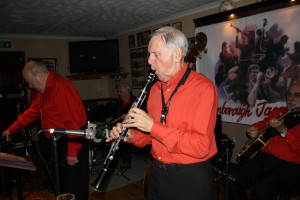 Goff Dubber plays clarinet with Mike Barry's Uptown Gang at Farnborough Jazz Club on 8th April 2016. (Goff to centre, Mike Barry & Graham Collicotte to left, John Stewart to right.) Photo by Mike Witt.