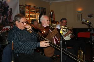'Bill Phelan's Muscrat Ramblers' at Farnborough Jazz Club on 27th May 2016. (LtoR) John Finch (trombone), Johnny McCallum (banjo), Bill Finch (trumpet) and Alan Cresswell (clarinet). Photo by Mike Witt.