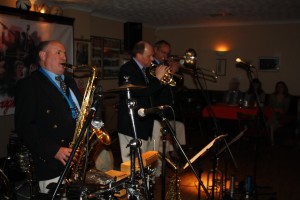 Mardi Gras JazzBand's front line - John Ellmer (tenor sax), Leigh Henson (trumpe)t and Rob Pearce (trombone) at Farnborough Jazz Club (Kent) on 13th May 2016. Photo by Mike Witt.