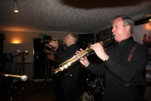 Tony's two Al's - Alan Gresty (trumpet) and Al Nicholls (saxes) with 'Tony Pitt's All Stars' at Farnborough Jazz club (Kent) on 6th May 2016. Photo by Mike Witt.