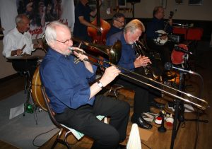 Golden Eagle Jazz Band at Farnborough Jazz Band on Friday, 17th June 2016. (LtoR) Pete Jackman (drums), Roy Stokes (trombone), Mike Broad (double bass) sorry he's hidden), Mike Scroxton (trumpet), Alan Cresswell (clarinet) and band leader Kevin Scott (tenor banjo(. Photo by Mike Witt.