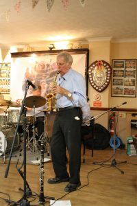 Goff Dubber playing alto sax, as one of 'Barry Palser's Super Six, here at Farnborough Jazz Club (Kent) on 15th July 2016. Photo by Mike Witt.