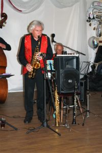  Charles Sherwood again, but this time, on tenor sax, with Dave Barnes on piano, playing for Phoenix Dixieland Jazz Band at Farnborough Jazz Club on Friday, 19th August 2016. Photo by Mike Witt.
