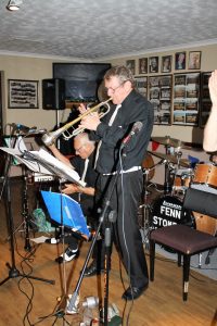 Dave Marchant takes a solo on trumpet, plus Dennis Vick of The Fenny Stompers at Farnborough Jazz Club's 'Battle of Britain' Anniversary fancy dress party on 16th September 2016. Photo by Mike Witt.